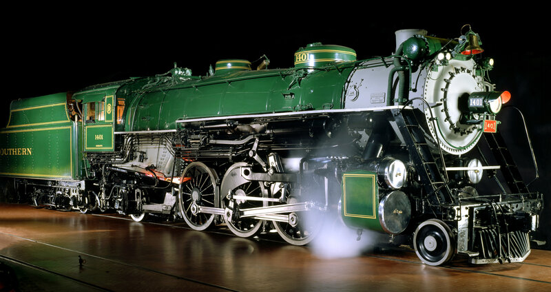 Green steam locomotive on display