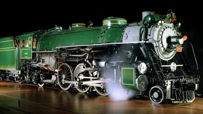 Green steam locomotive on display