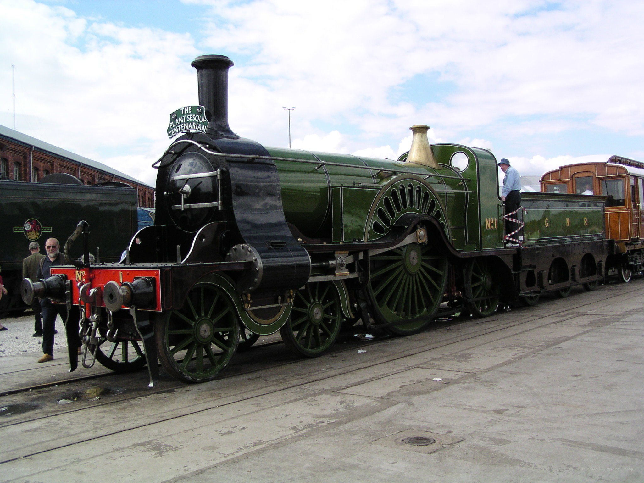 Green steam locomotive on display