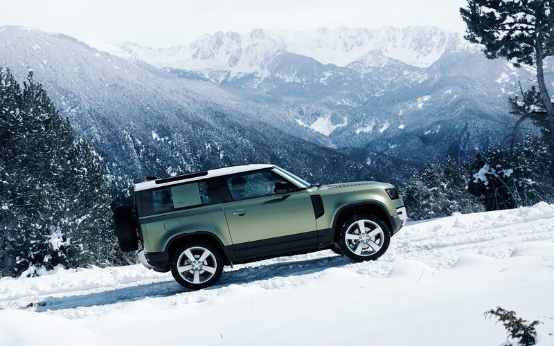 Green Suv in Snow