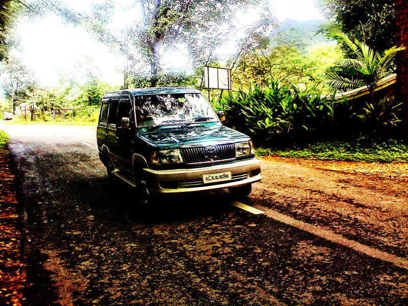 Green Suv on Road
