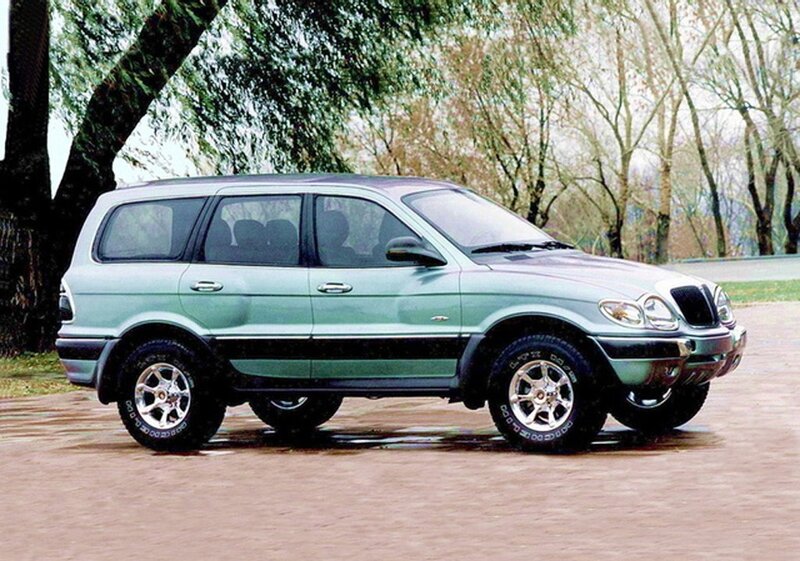green suv parked outdoors