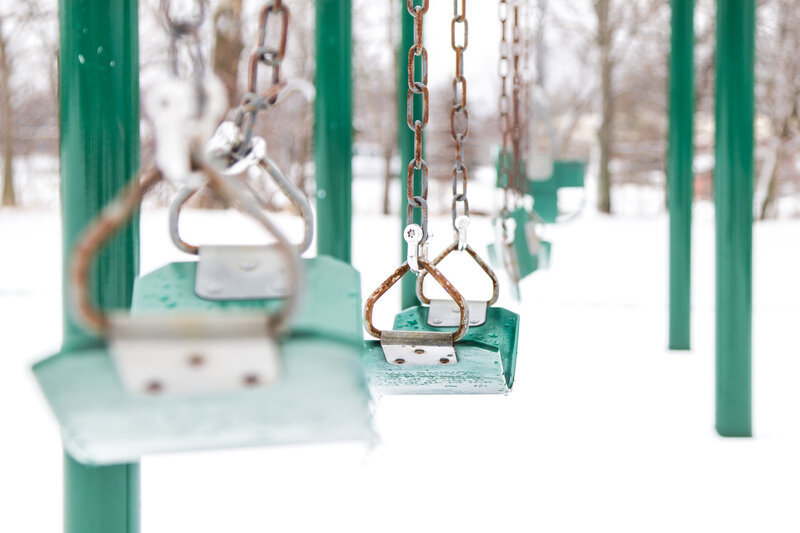 Green Swings in Snow