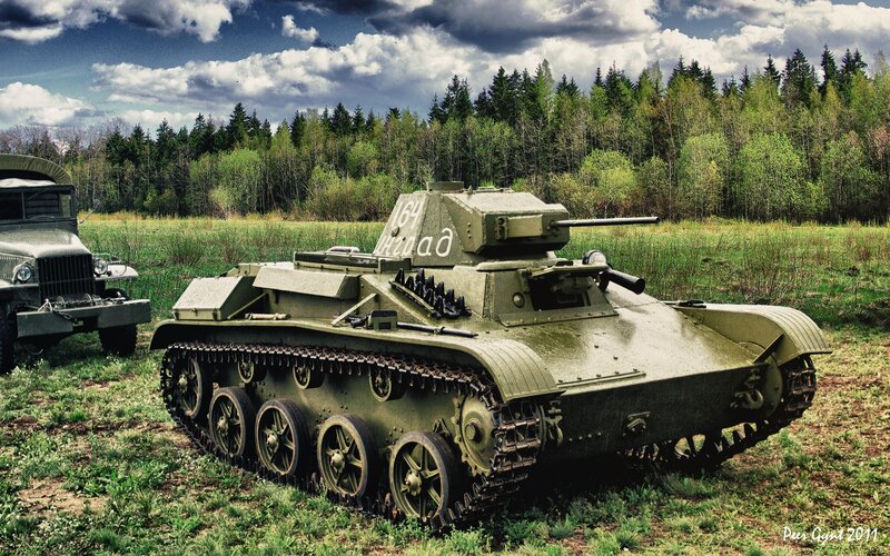 Green Tank in Field — Dramatic, Afternoon, Photograph