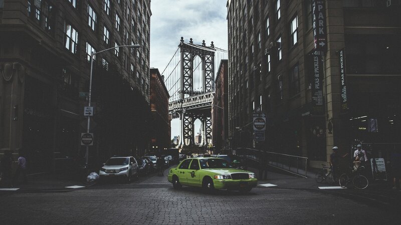 Green Taxi on Street — Gray