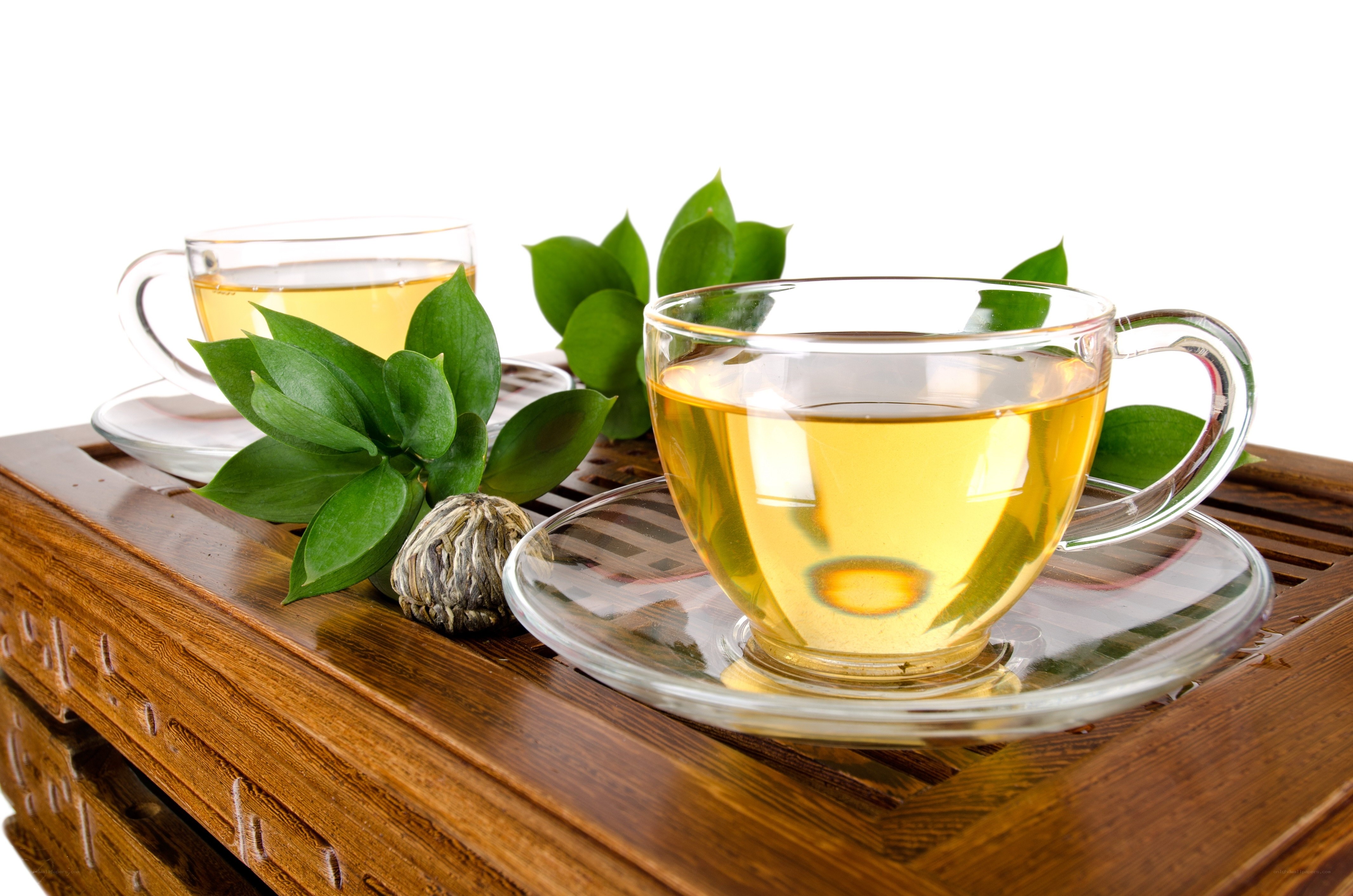 Green tea on wooden tray