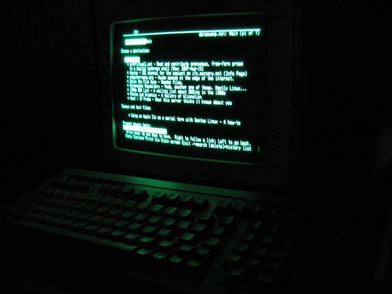 green terminal screen in dark room
