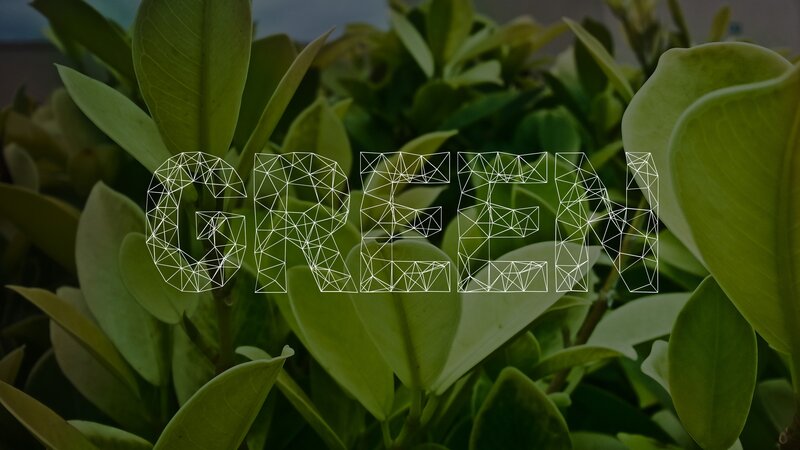 green text on leafy background