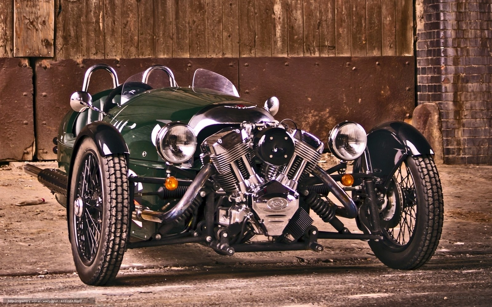 Green three-wheeled sports car