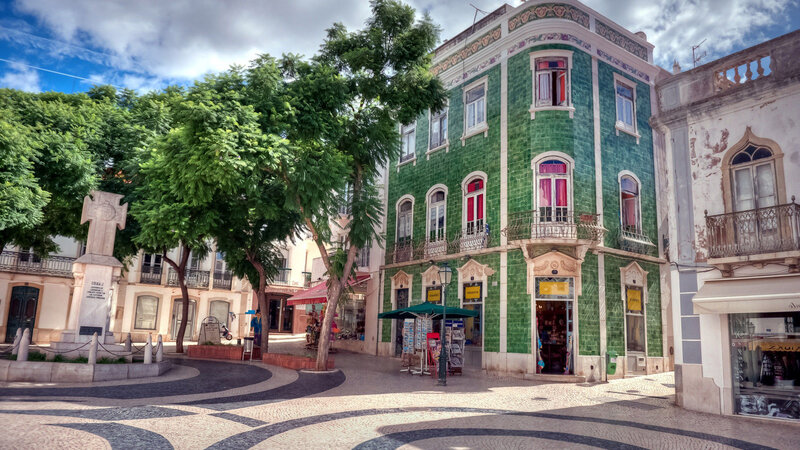 Green-tiled Building in Plaza