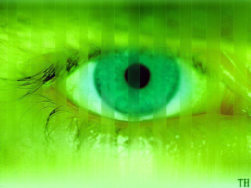 green-tinted eye with vertical lines