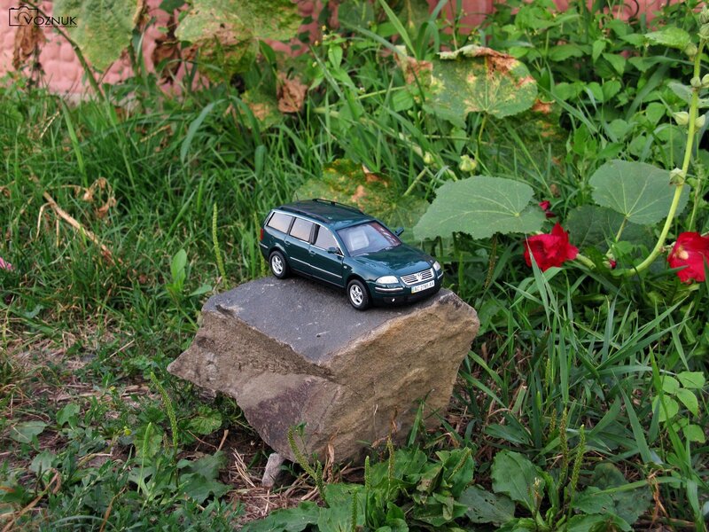 Green Toy Car on Rock