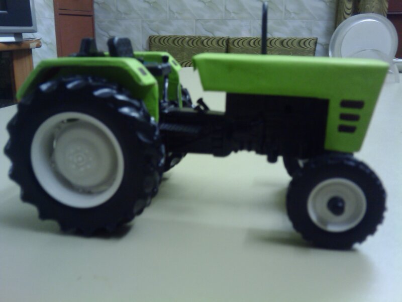 Green Toy Tractor — Neutral, Photograph