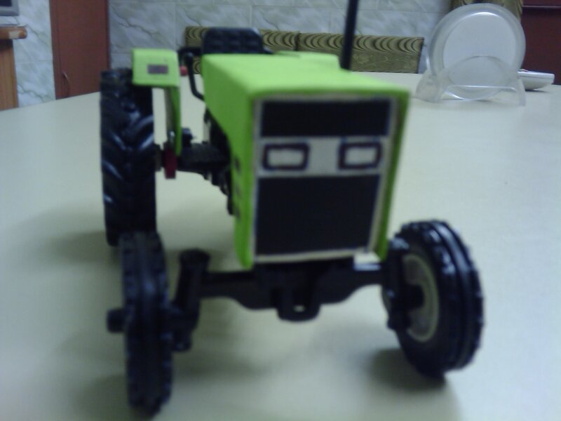 Green Toy Tractor — Neutral