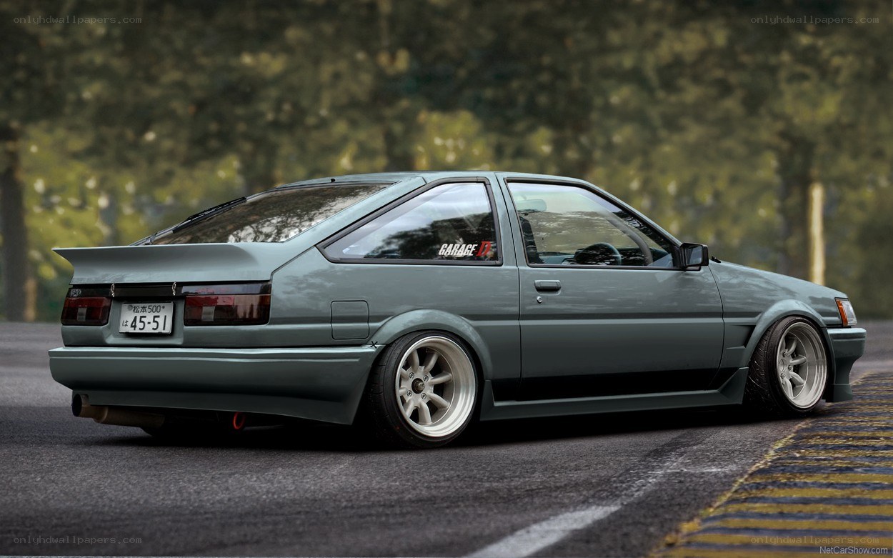 green toyota ae86 on road