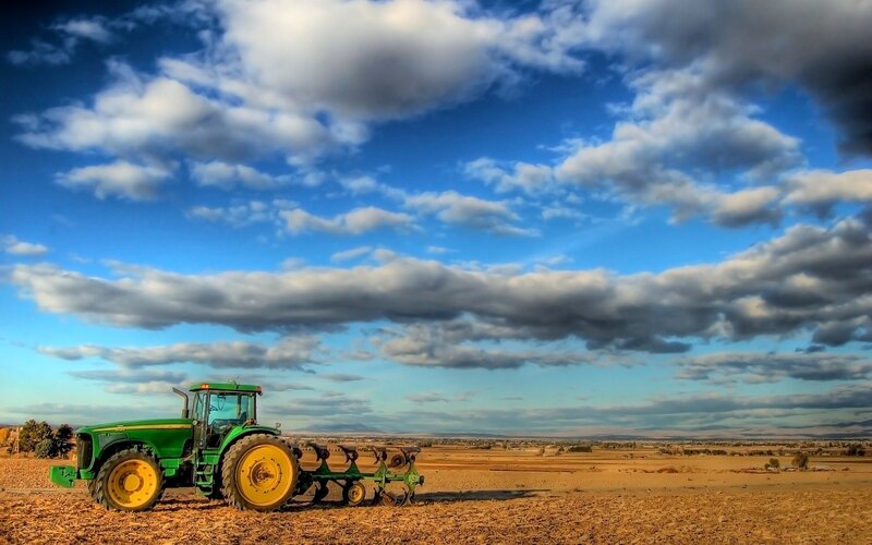 Green Tractor in Field — Afternoon