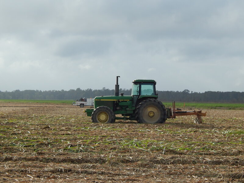 Green Tractor in Field — Overcast, Afternoon
