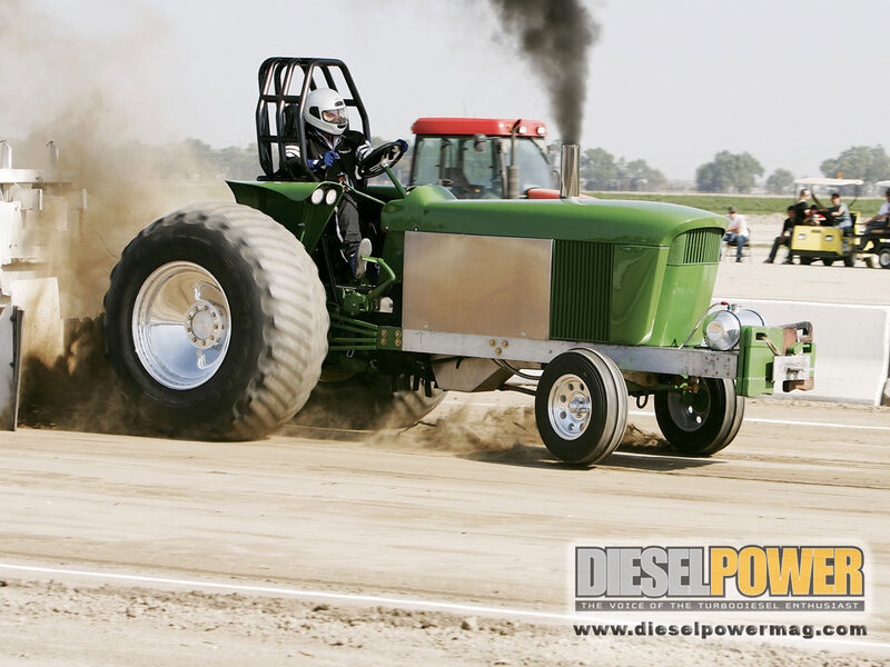 Green Tractor on Track