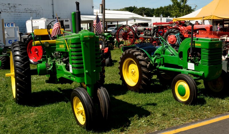 Green Tractors on Grass