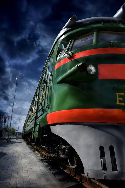 Green train at a station
