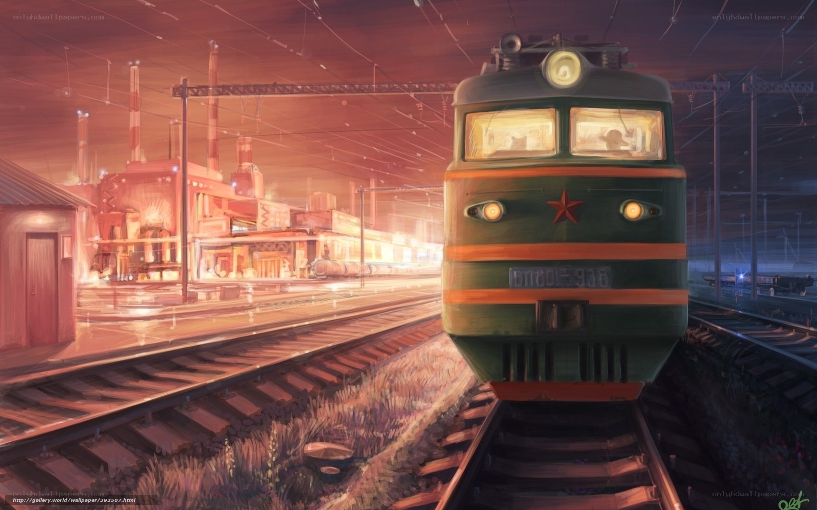 Green train at industrial station