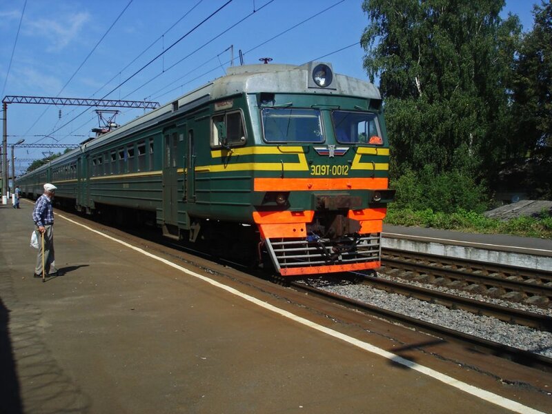 Green Train at Station