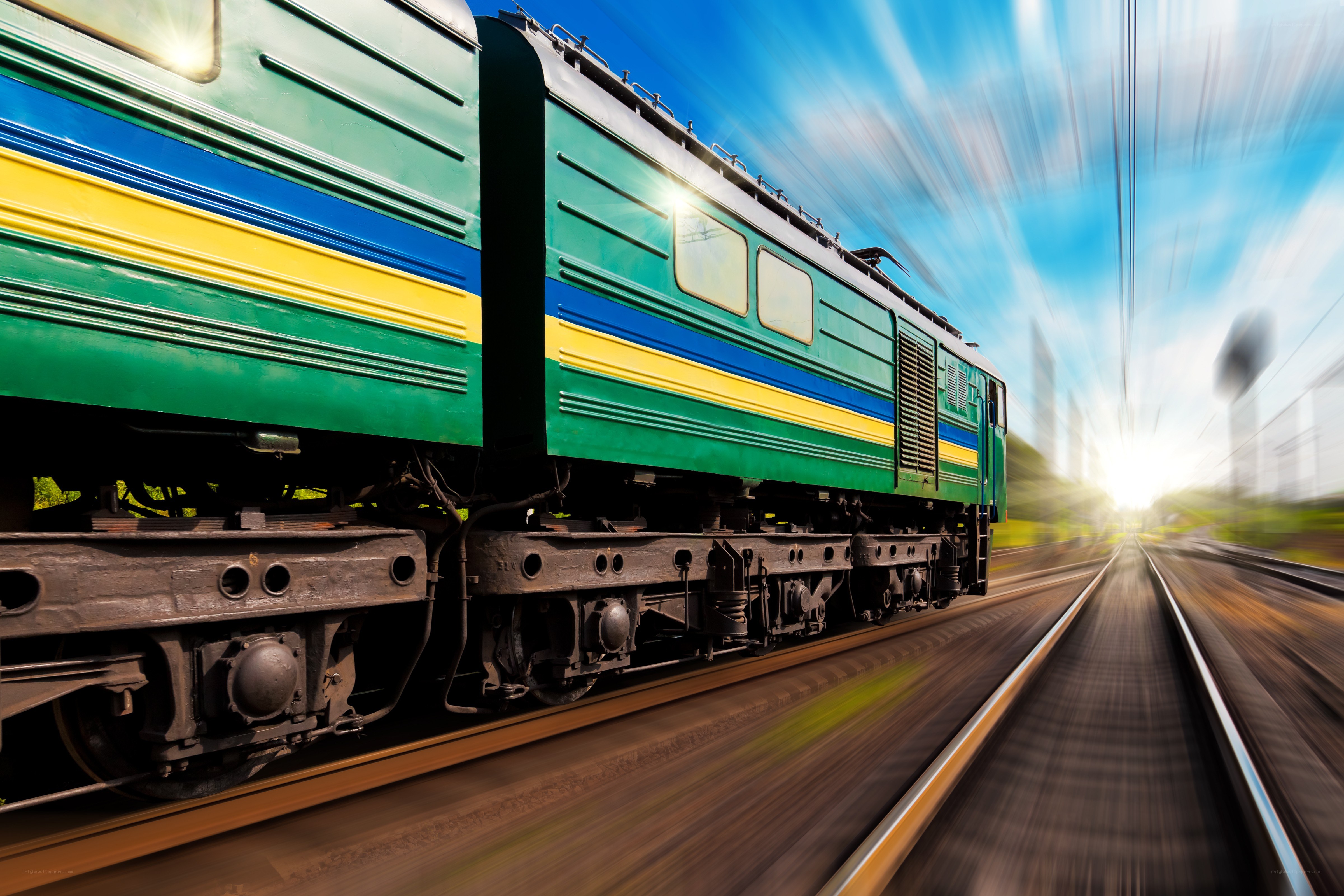 Green train in motion