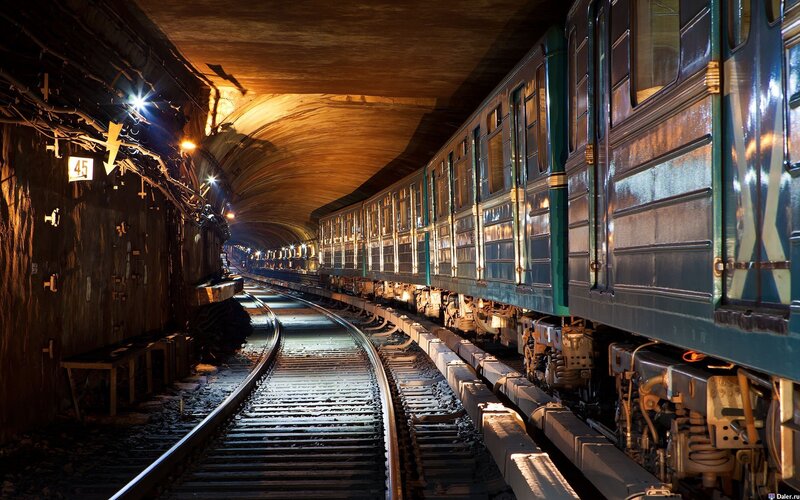 Green Train in Tunnel — Dramatic, Night, Photograph, Tracks