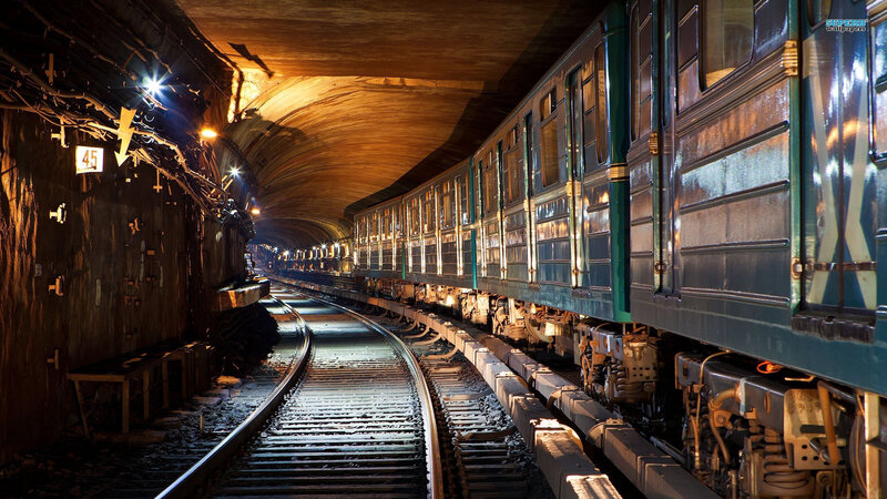 Green Train in Tunnel — Dramatic, Night