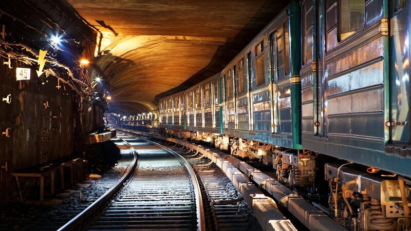 Green Train in Tunnel — Dramatic