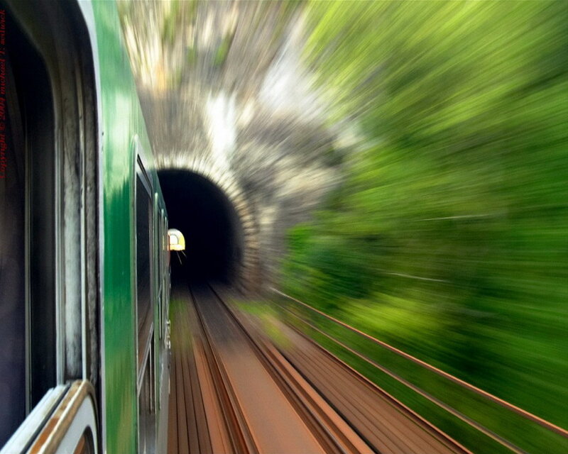 Green Train in Tunnel