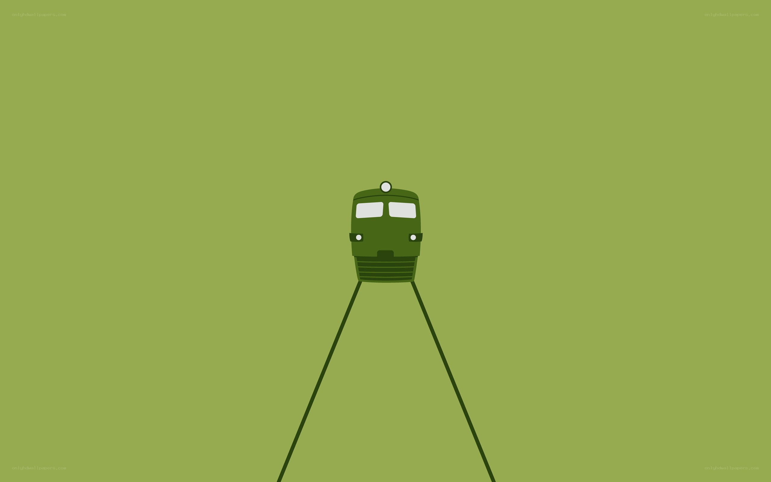 green train on tracks