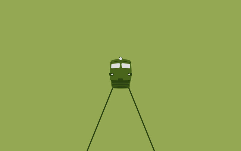 green train on tracks