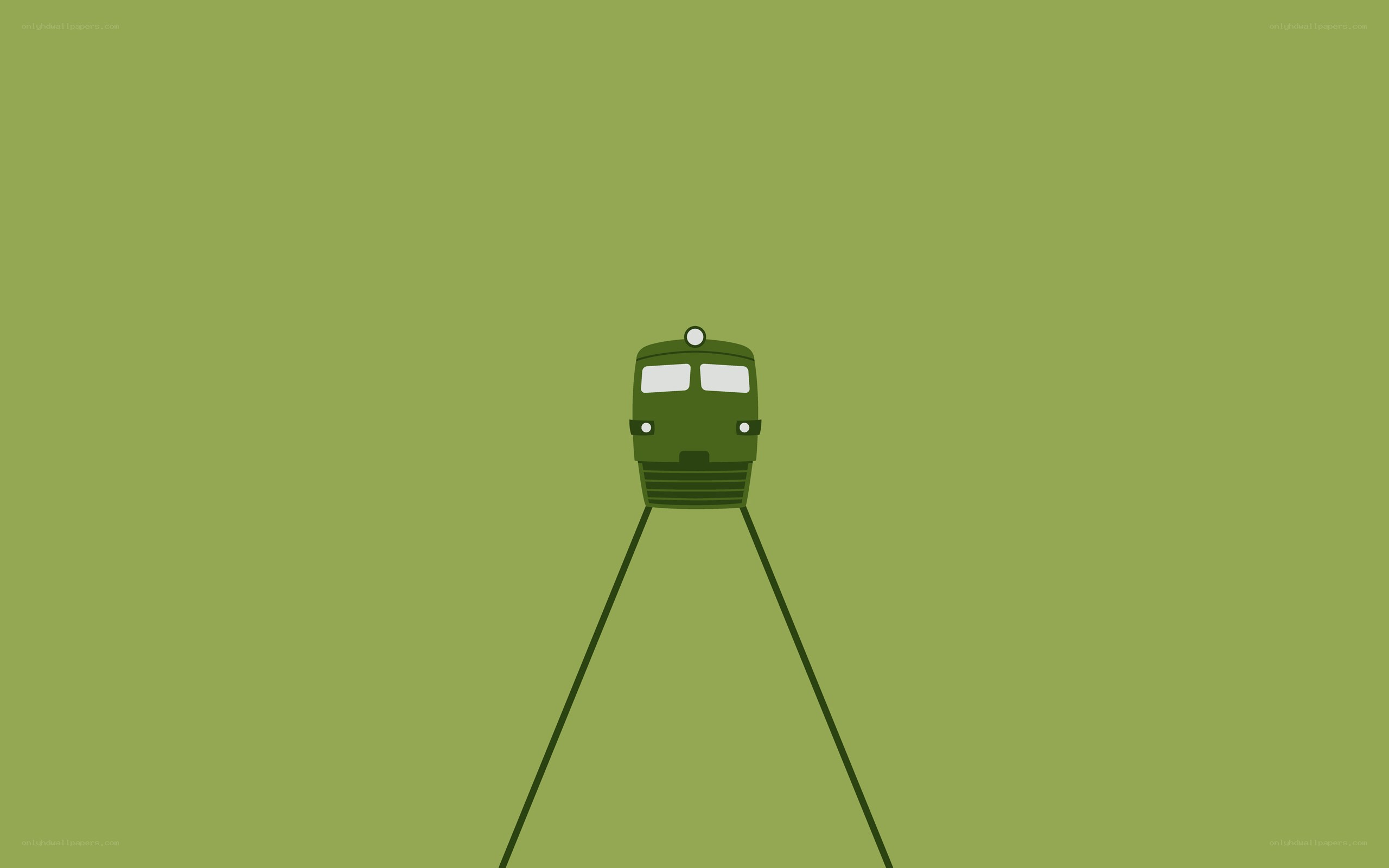 green train on tracks