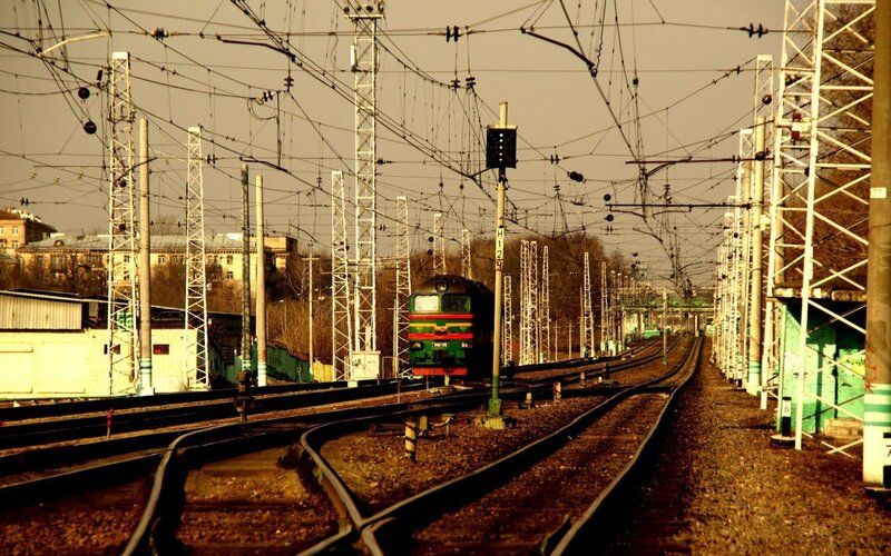 Green Train on Tracks — Brown