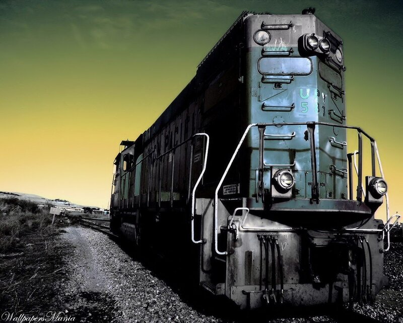 Green Train on Tracks — Dramatic, Sunset