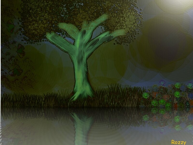 Green tree by the water
