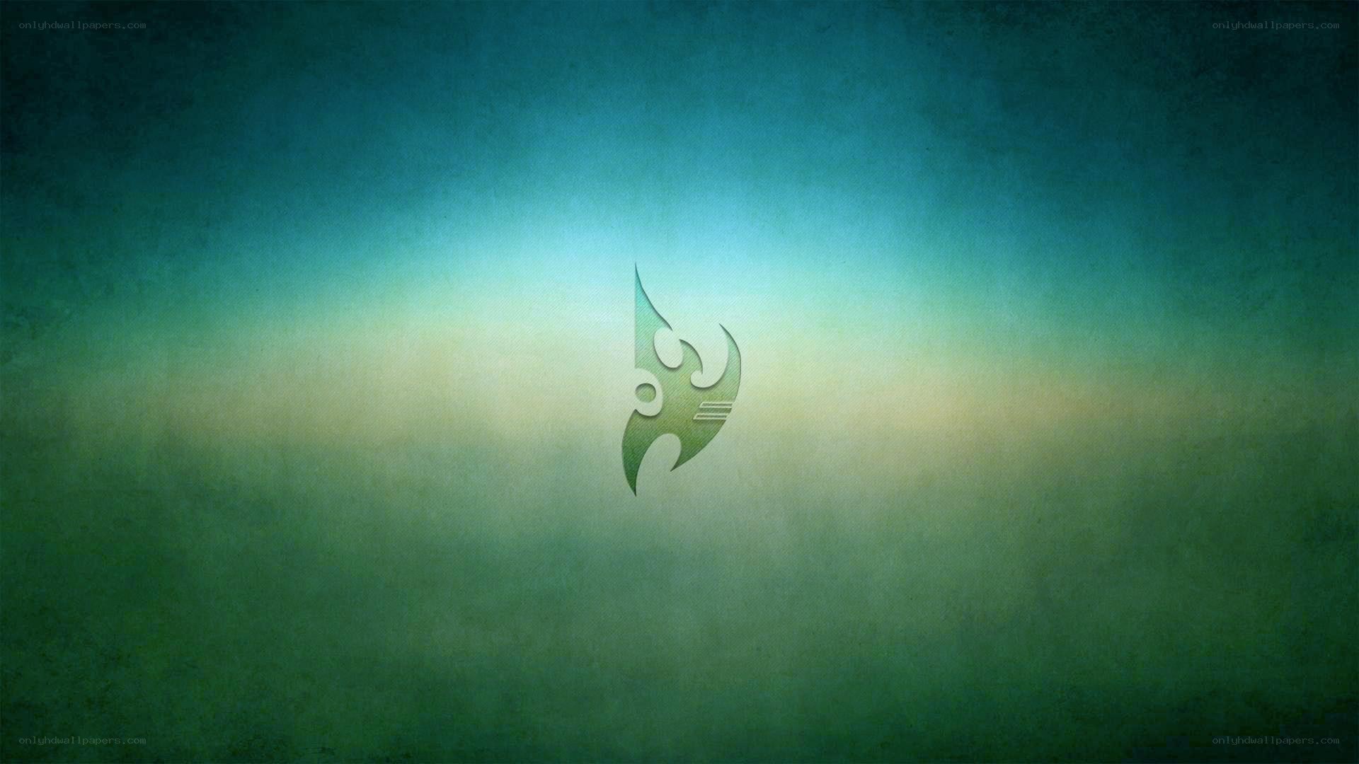 green tribal logo on gradient