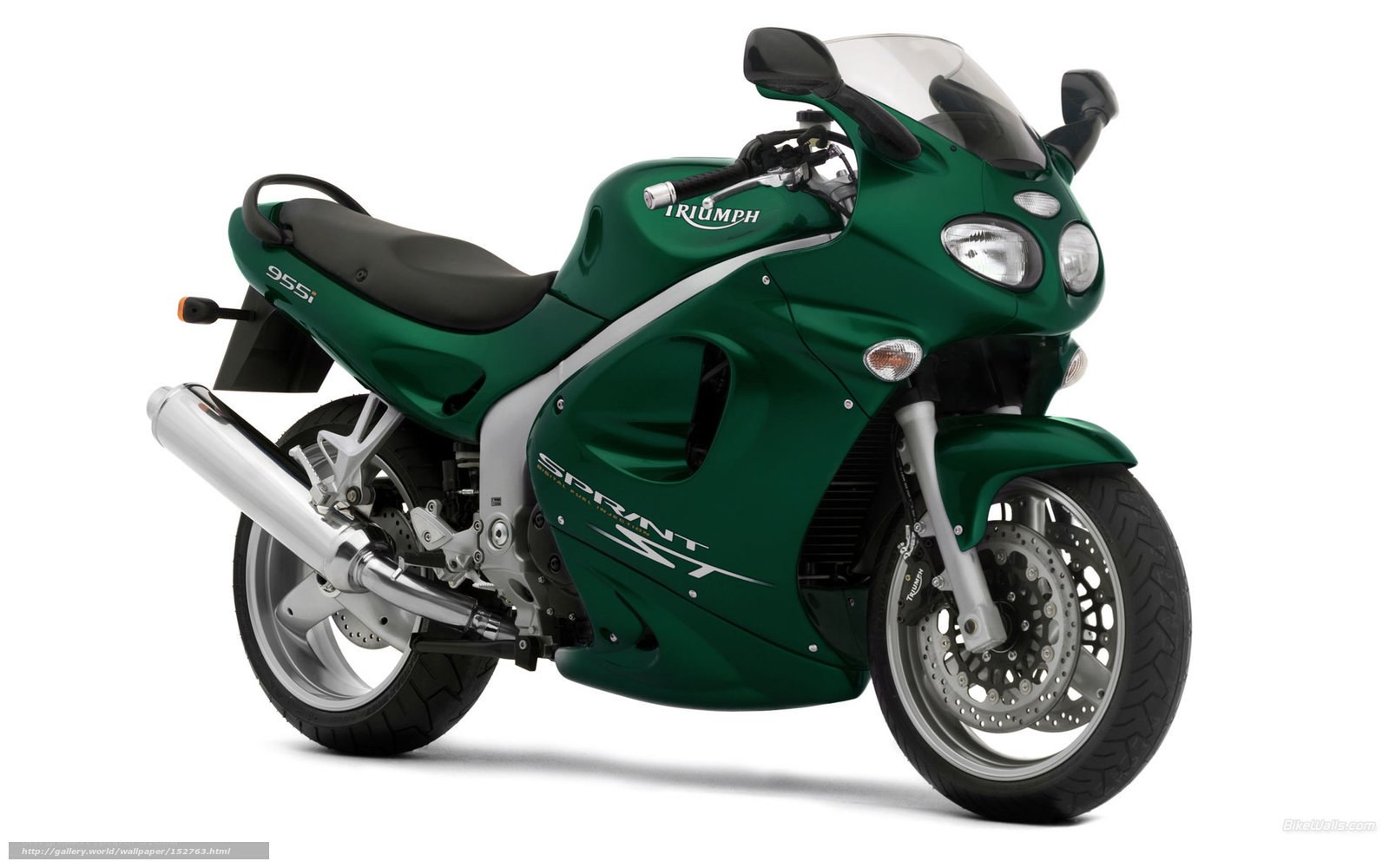 green triumph sprint motorcycle