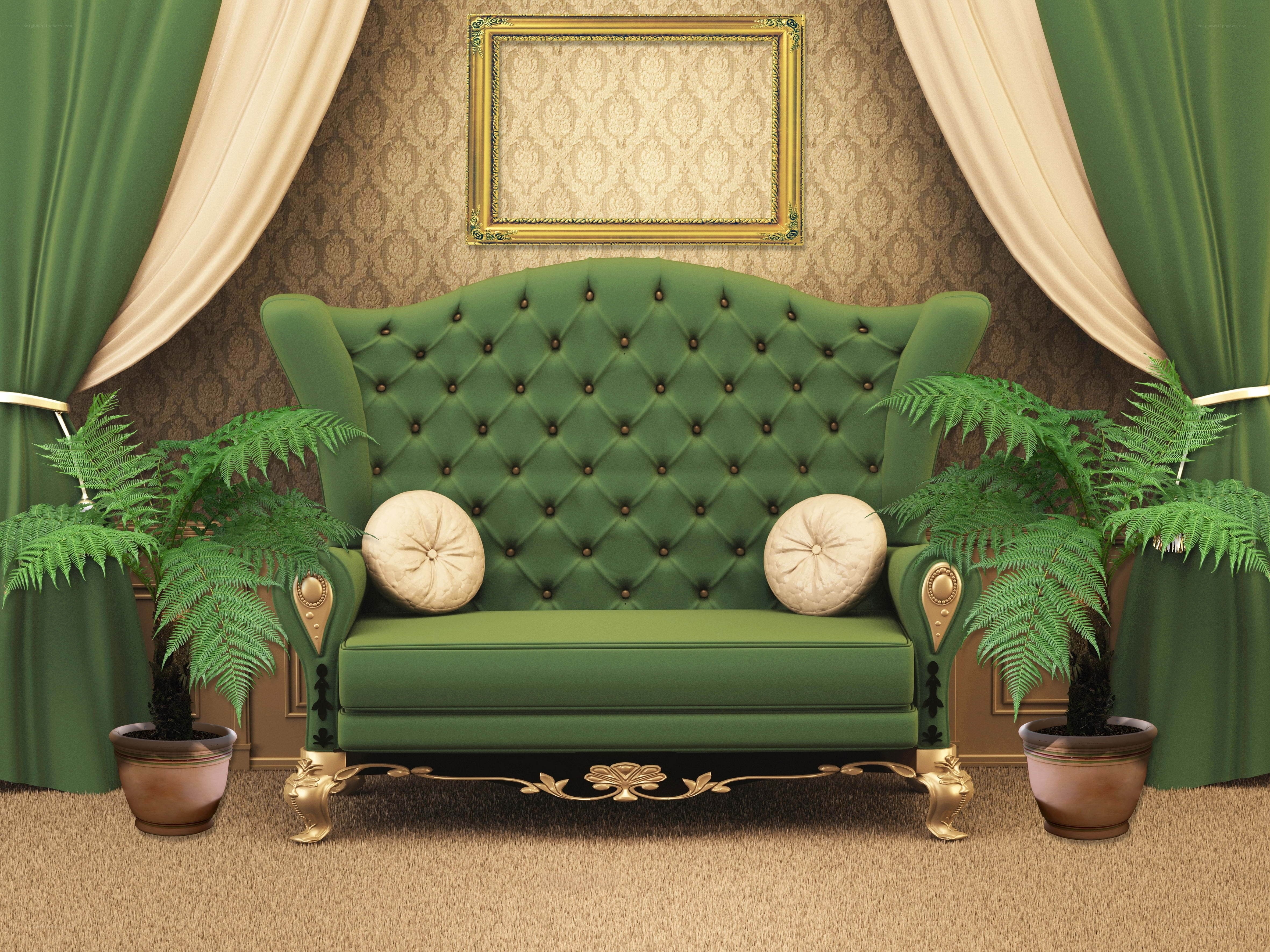 Green tufted sofa with plants