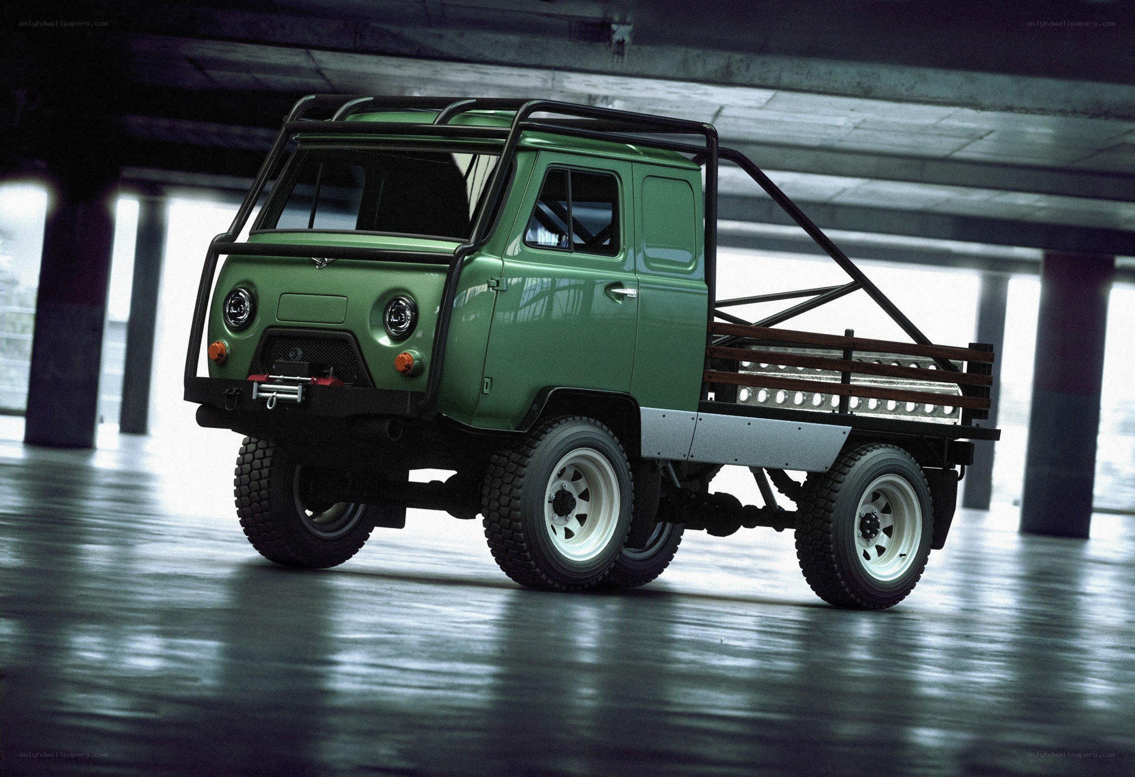 green utility truck in garage