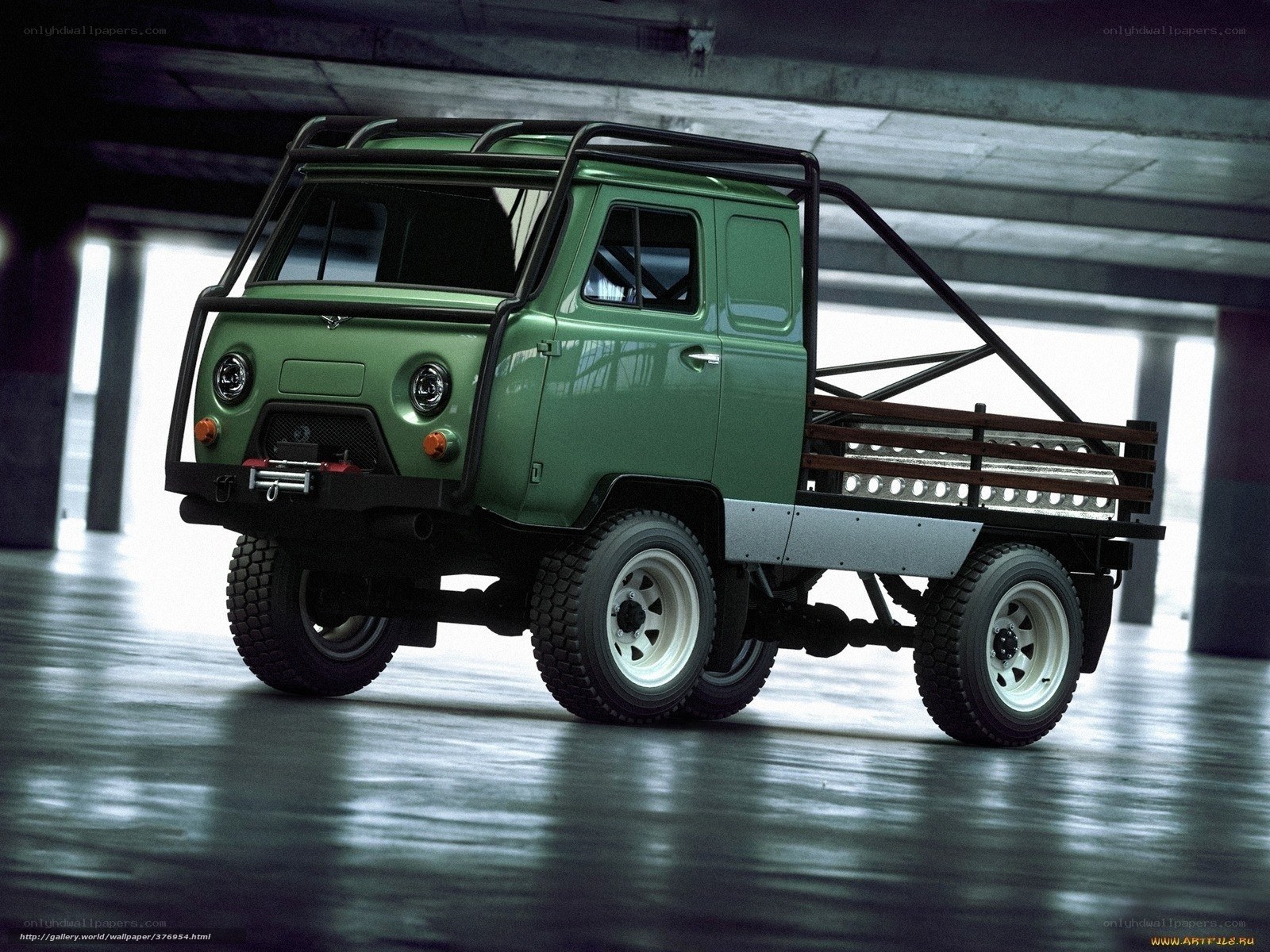 green utility truck in garage
