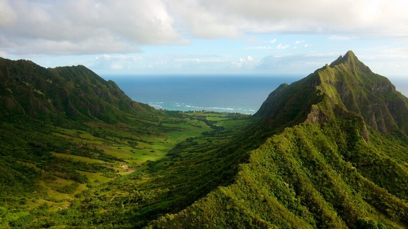 Green Valley Between Mountains — Serene, Afternoon, Photograph, Ocean, Sky