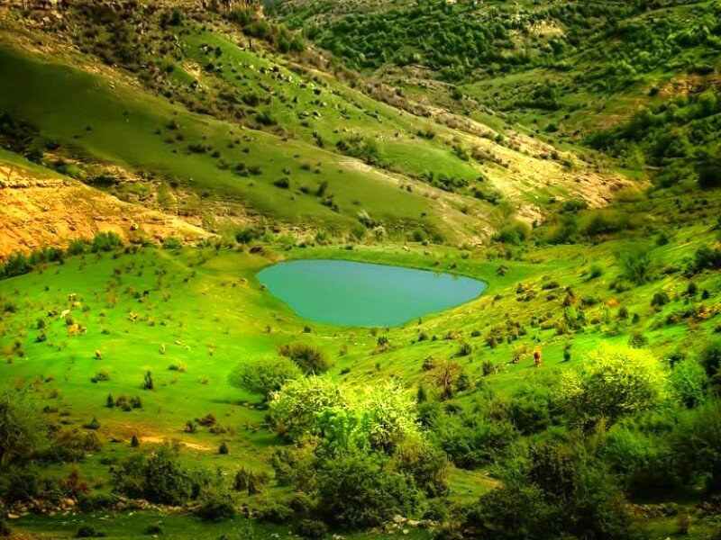 Green valley with lake