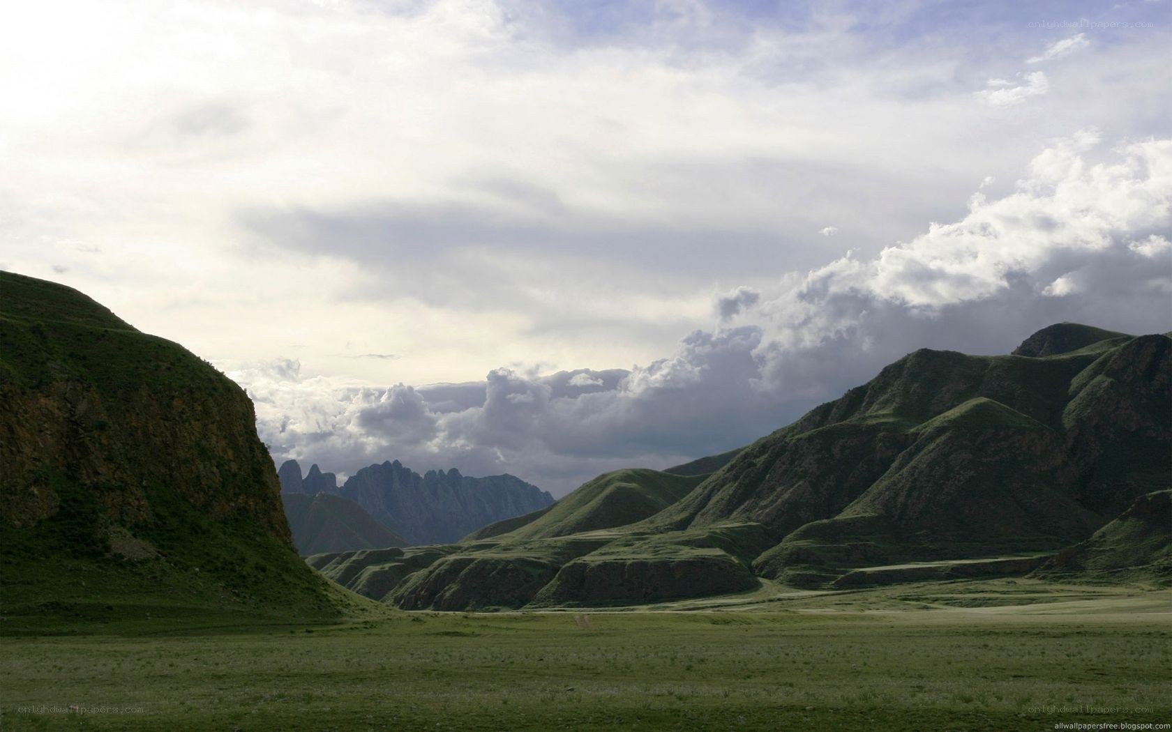 Green valley with mountains