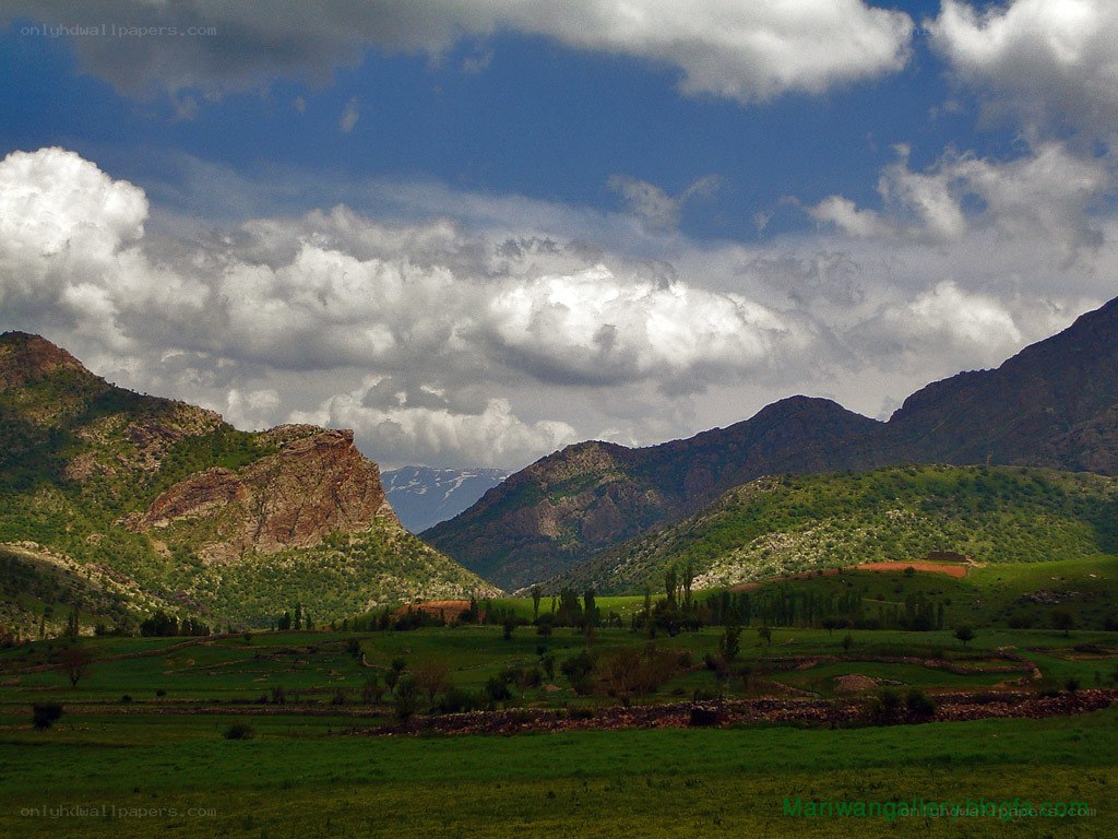 Green valley with mountains