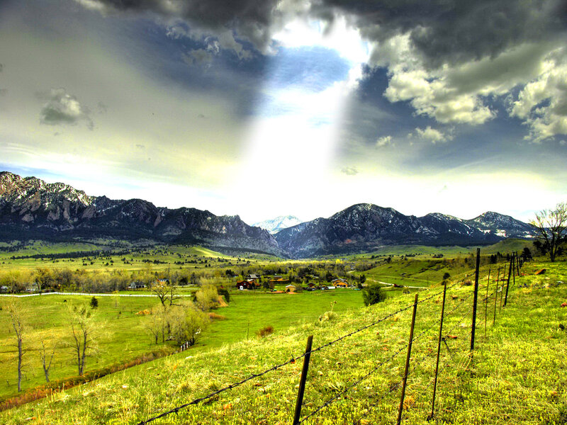Green Valley with Mountains — Dramatic, Afternoon, Photograph, Fence