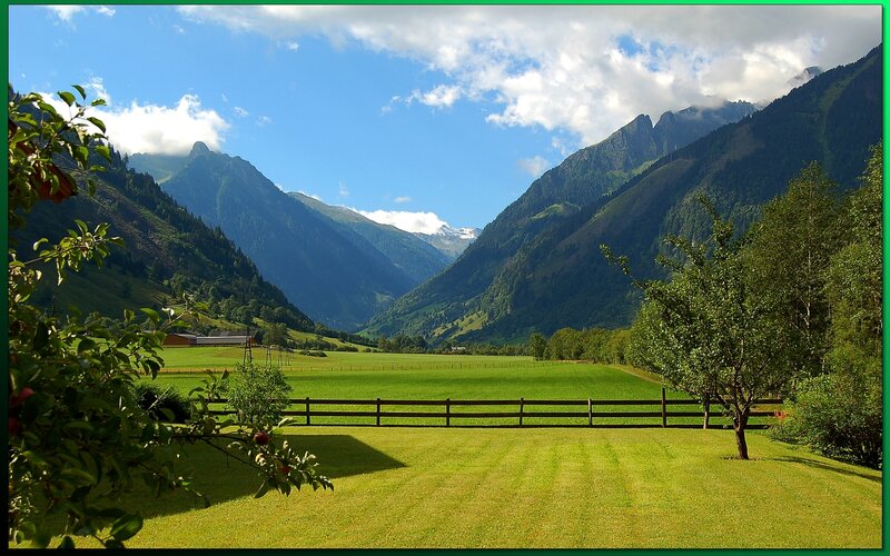 Green Valley with Mountains — Serene, Afternoon, Photograph, Fence