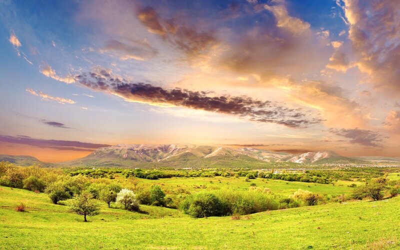 Green Valley with Mountains — Serene, Sunset, Photograph, Clouds