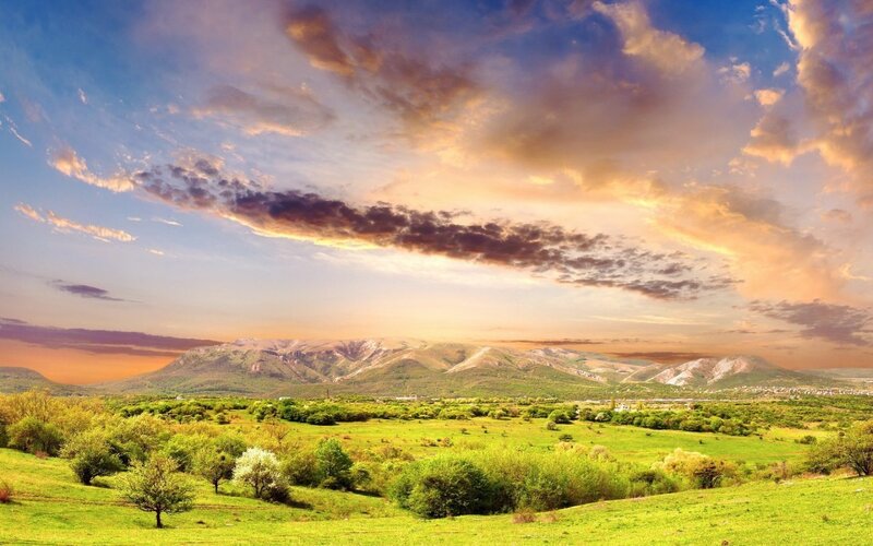 Green Valley with Mountains — Serene, Sunset
